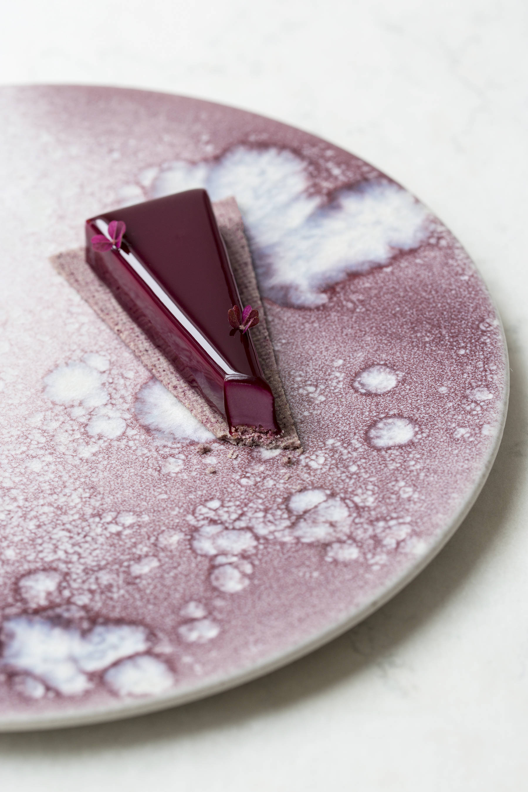 Blackcurrant triangles with white chocolate, balsamic and black pepper