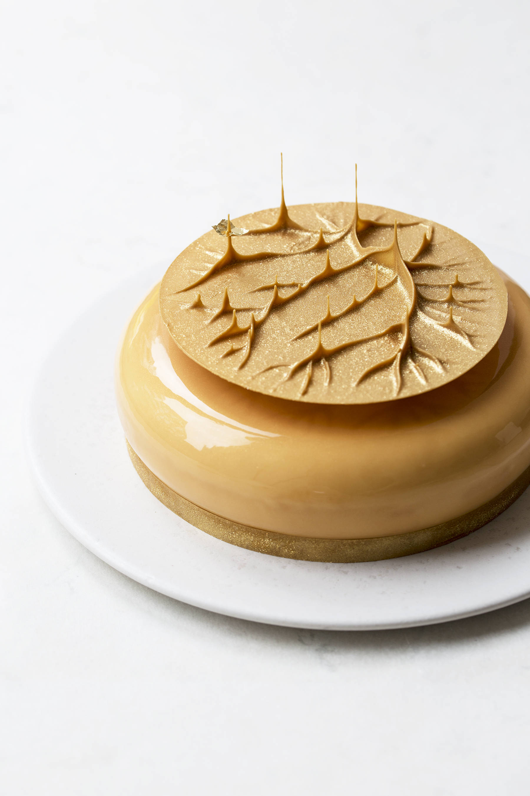 Champagne cake with marzipan, lemon and blueberries